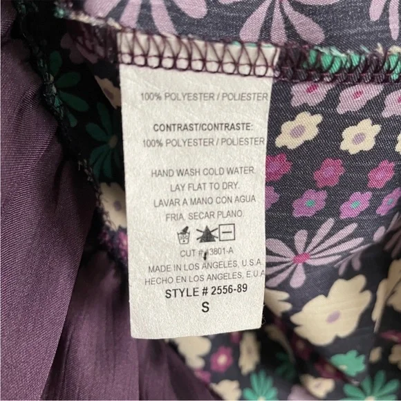 Unyx purple flower tunic. It is a bit sheer, you can see in the 4th picture - Picture 5 of 6